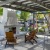 a patio with chairs and a table