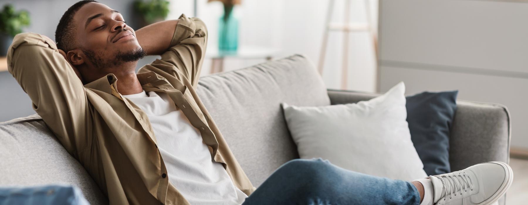 a person sleeping on a couch
