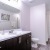 a bathroom with a large mirror
