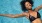 a woman in a swimsuit in the water